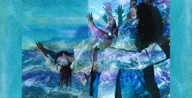 Leila & Noelle Awadallah dance in front of blue water projected onto a white wall.