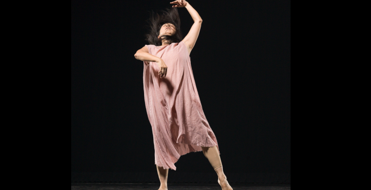 Ayako Kato dancing in a gentle pink soft gauze dress with the feeling of between heaven and earth