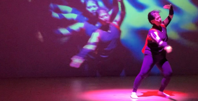 A still from "Beyond the Box, 4.3," featuring performer Yoshinojo Fujima (pictured). Image courtesy of Asian Improv aRts Midwest 