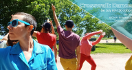 Text reads, “Crosswalk Dances Sat July 8th 1:30 - 3:30 PM Riis Park 6100 W Fullerton Ave Chicago IL 60639”. Photo shows Kait, in a blue shirt and blue sunglasses, looking to their right as Amanda and Tim face backward, extending their left arm high.